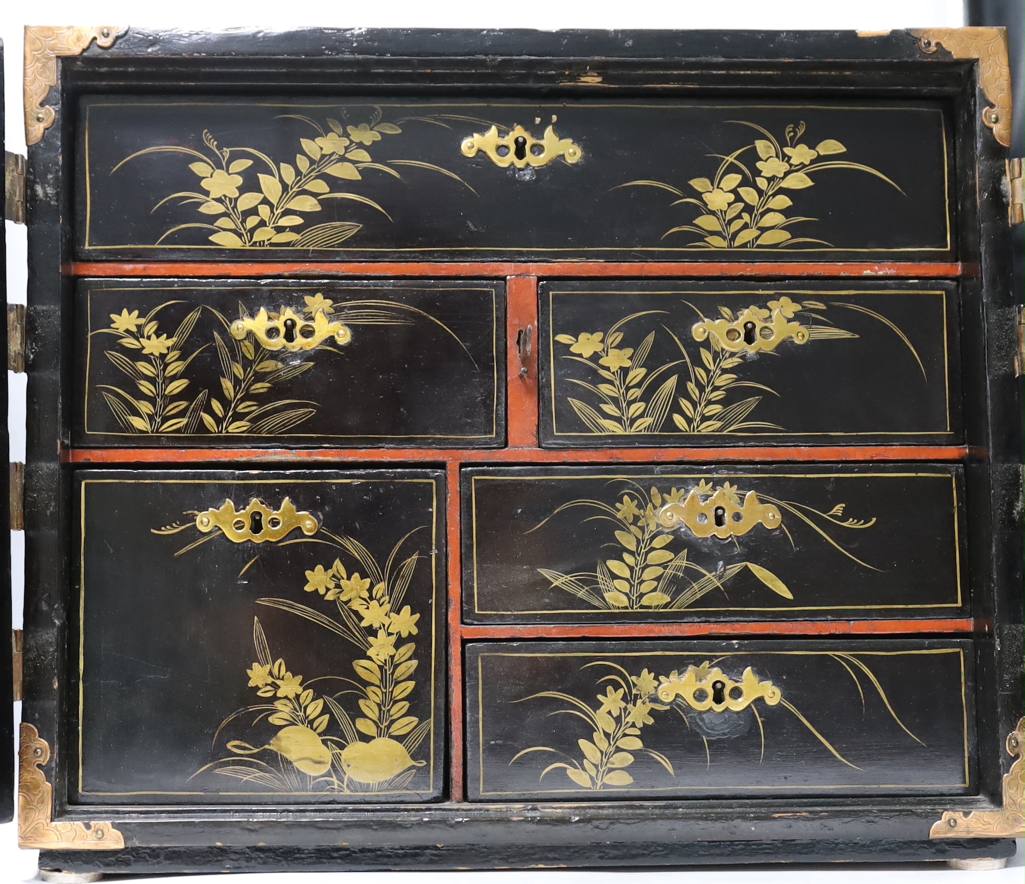 A 19th century Japanese lacquer table cabinet, 44cm wide